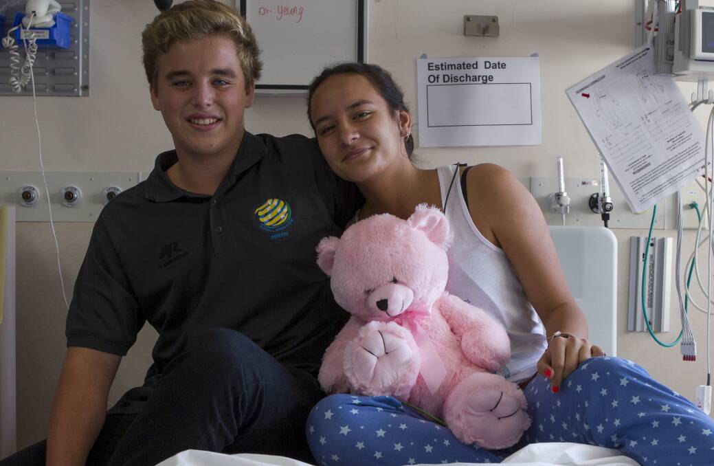 16-year-old Emma Douglas collapsed during a soccer match when her heart stopped and was revived by a group of by-standers including 16-year-old soccer referee Max Vercoe. Picture: CHRISTOPHER CHAN.