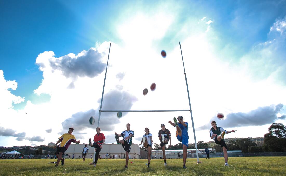 Jamaine Kinsela, Rhylee Brisbane, Izahya Clay, Tanika Davis, Raymond Hardy, Solomon Olive, Kieren Worthington and Andrew Coppens taking part in the region-wide NAIDOC touch football competition for schools at Illawarra Sports High. Picture: ADAM McLEAN