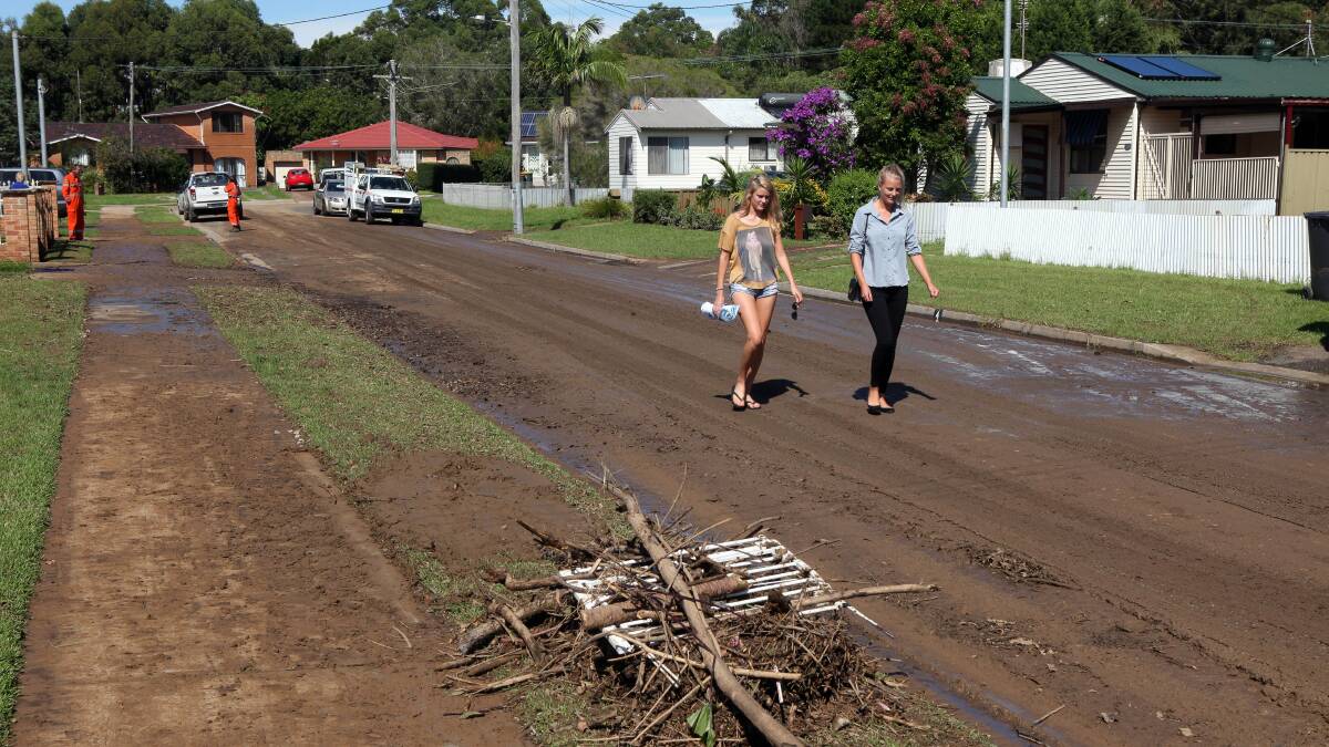 Sisters Renee and Jessica Pyers walk along Benelong St, Bulli, on March 25. Picture: KIRK GILMOUR