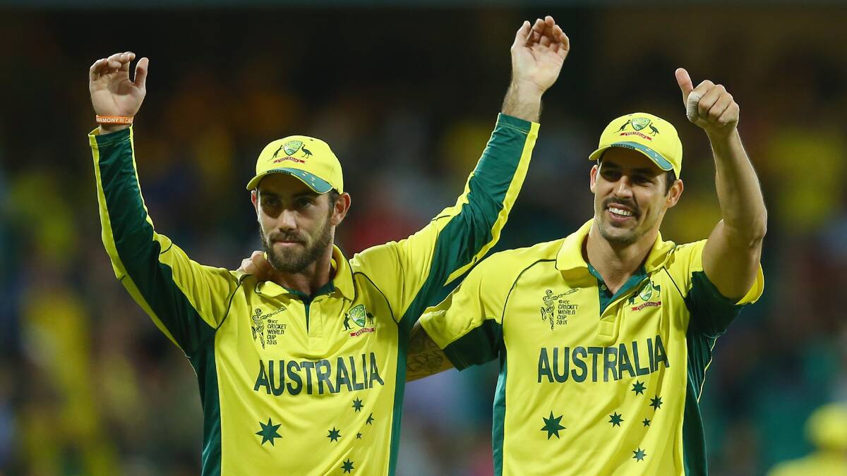 Maxwell and Mitchell Johnson  wave to the crowd as they celebrate victory during the 2015 Cricket World Cup Semi Final match between Australia and India at Sydney Cricket Ground. Picture: GETTY IMAGES