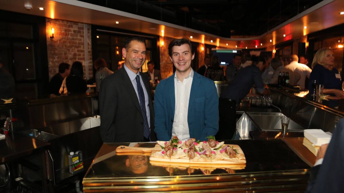 Warwick Shanks and Adam Murphy at a function in the middle level of the new Humber Bar in Wollongong on Wednesday night. Picture: GREG ELLIS