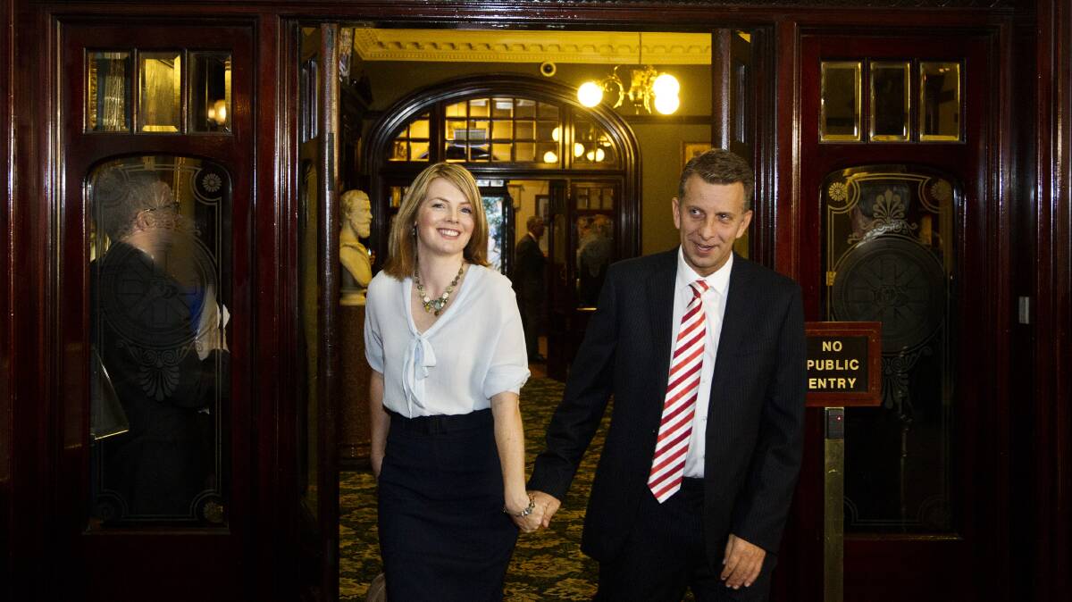 NSW Treasurer Andrew Constance and his partner Jennifer Clarke leave Parliament after he gave the state budget address. Picture: NIC WALKER