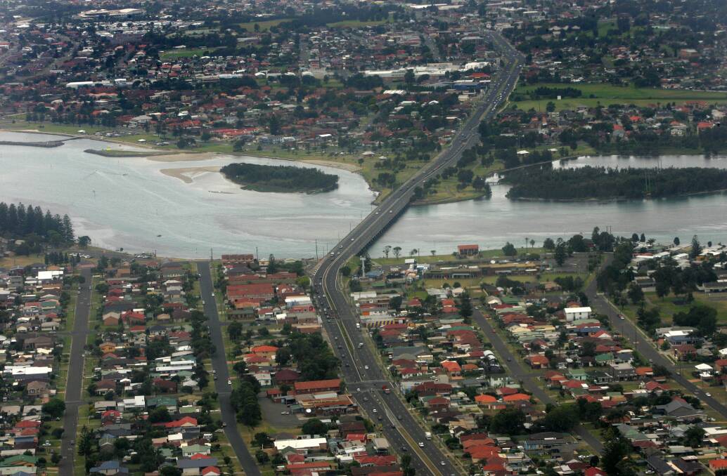 Windang Bridge had separated Shellharbour City Council area (top), which qualifies as a regional area, and metropolitan Wollongong City Council.