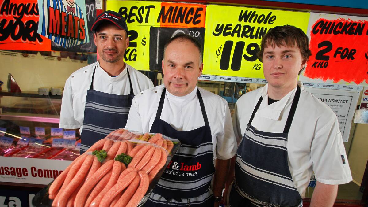 Jason Colbeck, Ben Kerr and Jamie Radloft, from Thirroul Plaza Meats, are   NSW sausage kings.  Picture: CHRISTOPHER CHAN