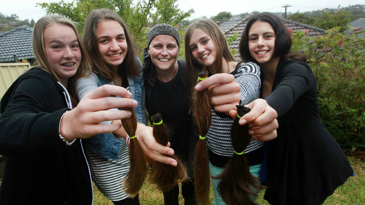Personal gift: Brooke Williams, Leah Puglisi, Michaela Slobin, Alana Agostini and Beatriz Monteirorebelo, who donated the ponytails to be made into wig.  Picture: SYLVIA LIBER