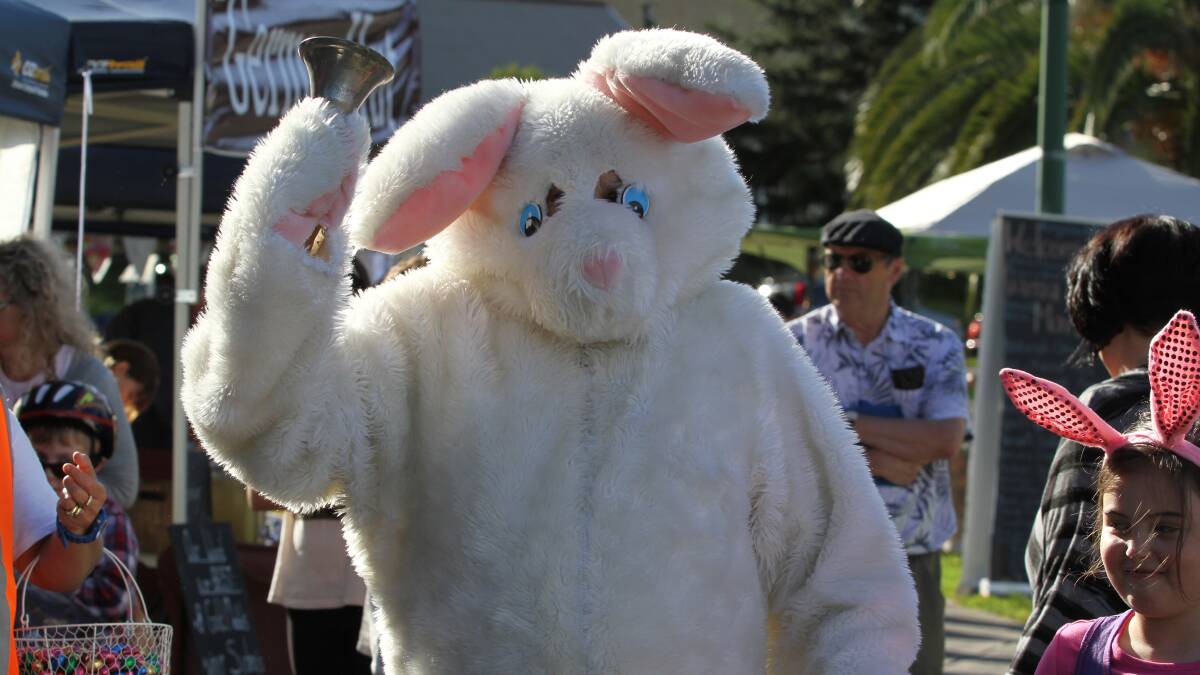 The Easter Bunny rings the bell to open the Markets on Wednesday.