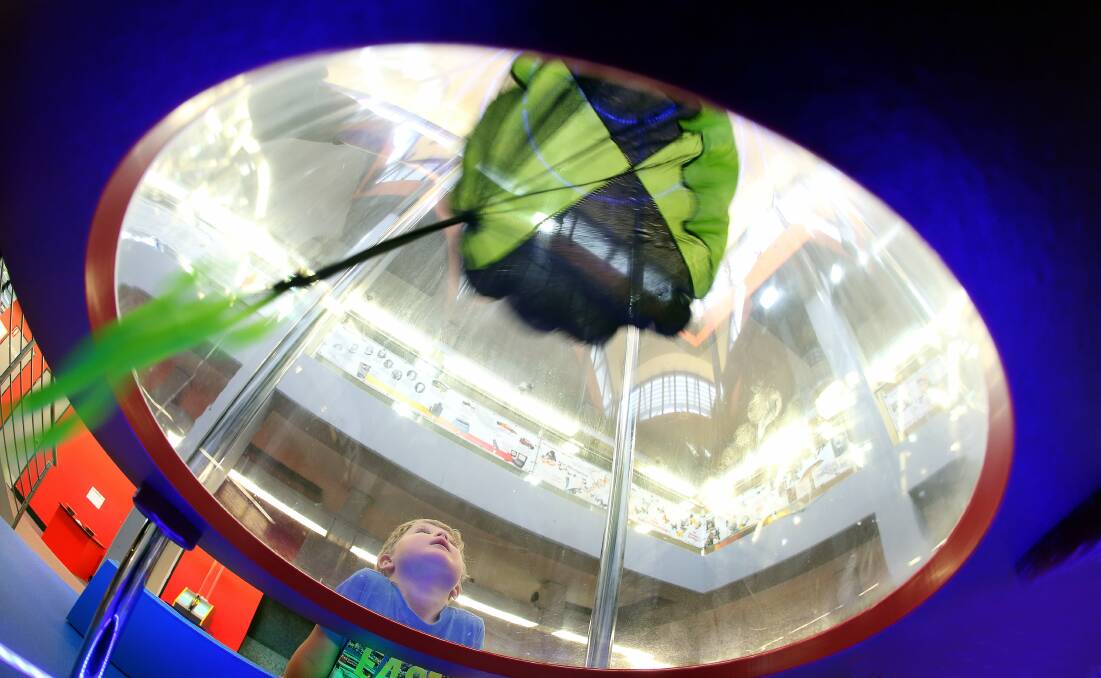 Ben Dixon aged 3 has some fun with the wind tube at Wollongong Science Centre - one of the great places to entertain the kids these school holidays. Picture. Kirk Gilmour