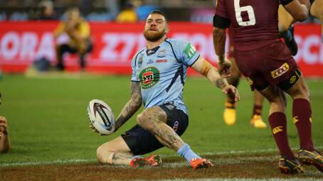 Dragons fullback Josh Dugan scores a try for NSW in the second State of Origin game in Melbourne. Picture: JONATHAN CARROLL
