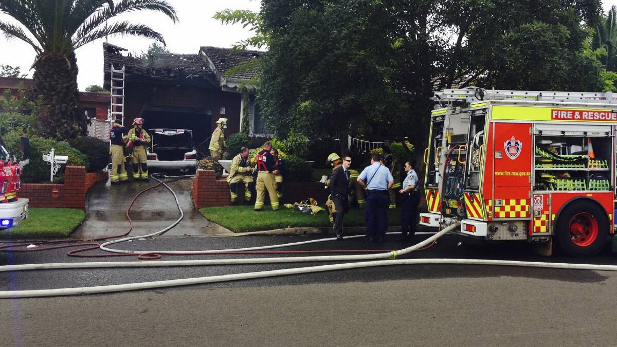 An Albion Park Rail house has been badly damaged in a fire after a car combusted. Picture: ROBERT PEET