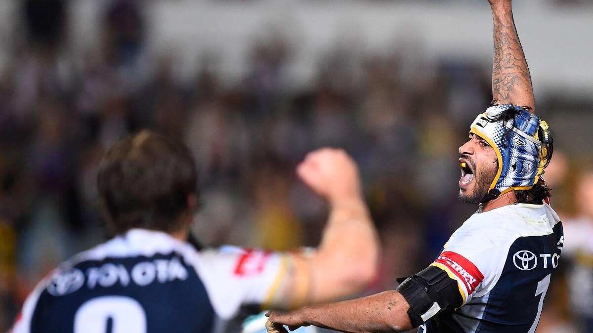 Cowboys captain Jonathan Thurston celebrates his extra time field goal against the Cronulla Sharks. Picture: GETTY IMAGES