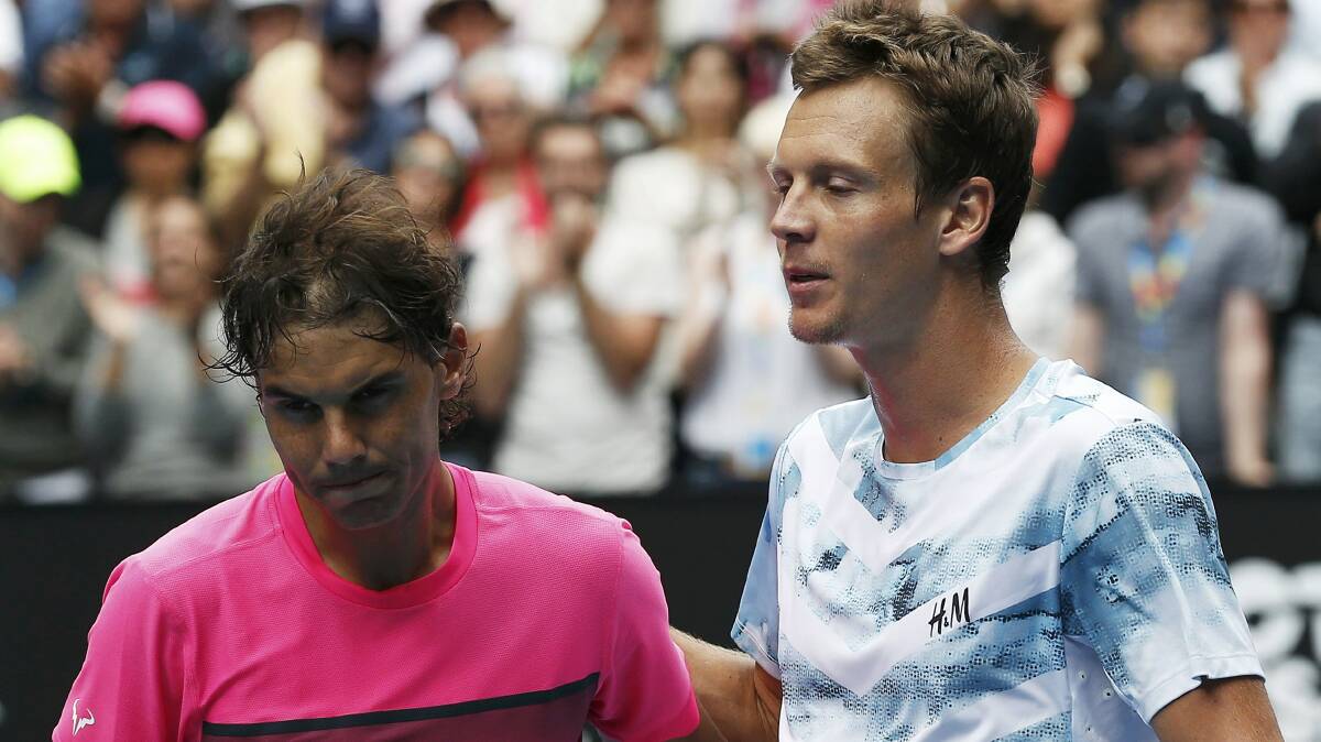 Tomas Berdych (right) and Rafael Nadal after their Australian Open singles quarter-final. Picture: GETTY IMAGES