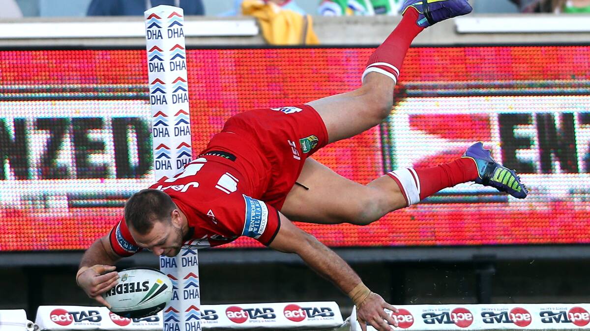 Jason Nightingale scores for St George-Illawarra against Canberra on Saturday. Picture: GETTY IMAGES