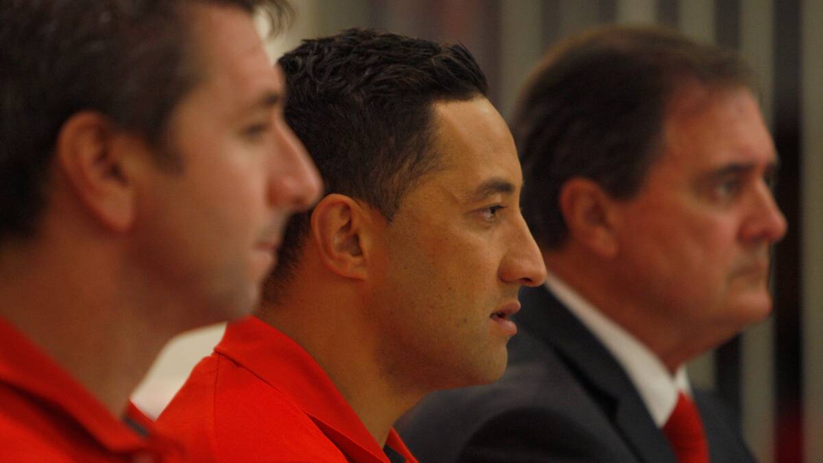 Benji Marshall (centre) announces his decision to join the Dragons on Friday. Picture: GETTY IMAGES
