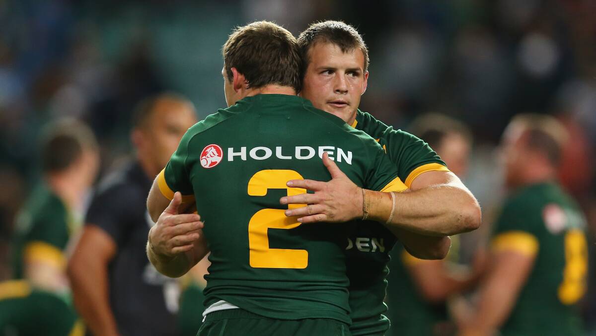 Brett and Josh Morris embrace as they celebrate the Anzac Test victory. Picture: GETTY IMAGES