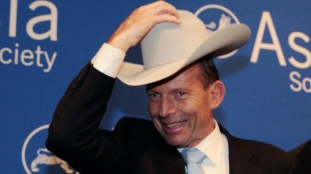 Prime Minister Tony Abbott was presented with a Stetson and made an honorary guest of Texas when he spoke at the Asia Society in Houston last Friday. Picture: ANDREW MEARES