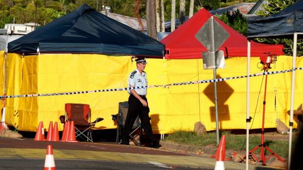 Police at the house where eight children were killed. Picture: EDWINA PICKLES