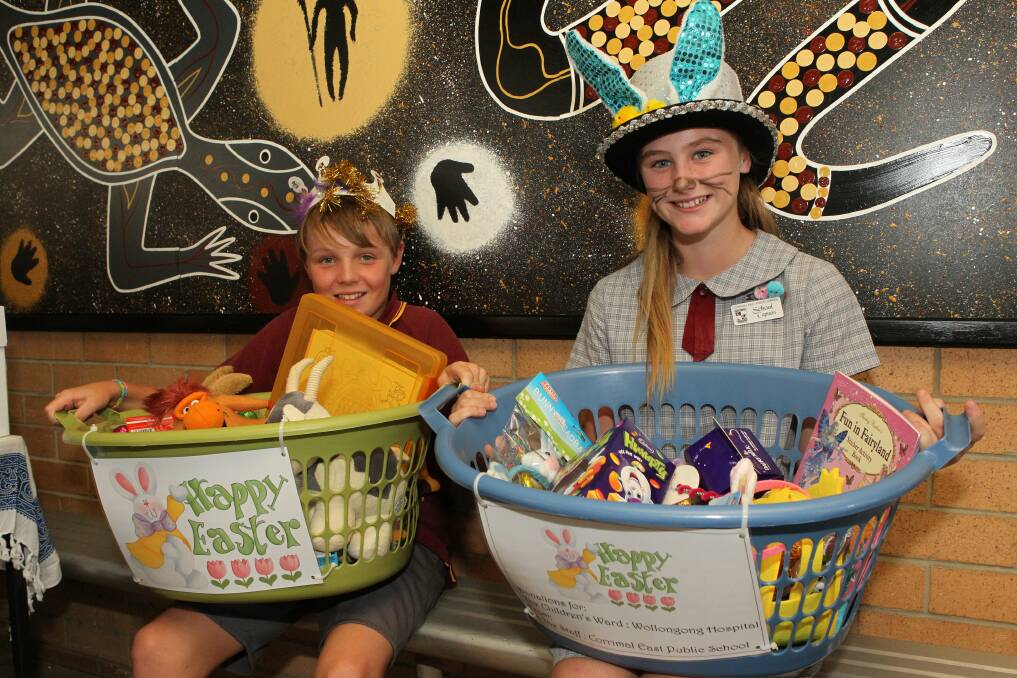 School captains Bailey and Evie with donations for Wollongong Hospital. Picture: GREG TOTMAN