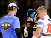 Jamie Soward of the Panthers and Mike Cooper of the Dragons scuffle during the round 14 match at Sportingbet Stadium. Picture: GETTY IMAGES