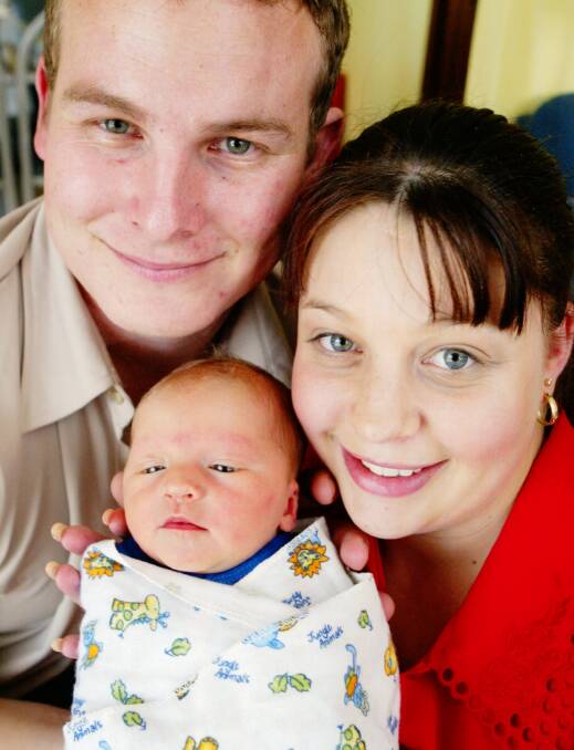 Proud parents Jonathan and De-Arn Hall with their baby, Brydon James Hall. De-Arn, one of Dapto's famous Clout triplets, had battled leukaemia and was told she would never have children.