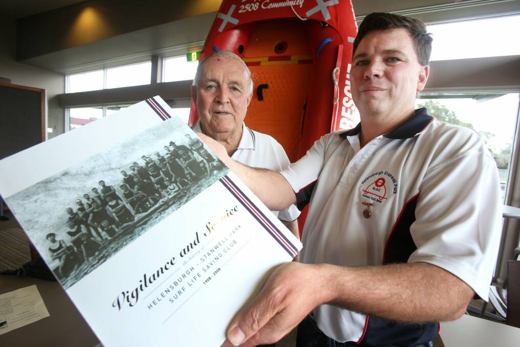 Club member Evan Griffiths and president Steven McDonald at the book launch. Picture: ROBERT PEET