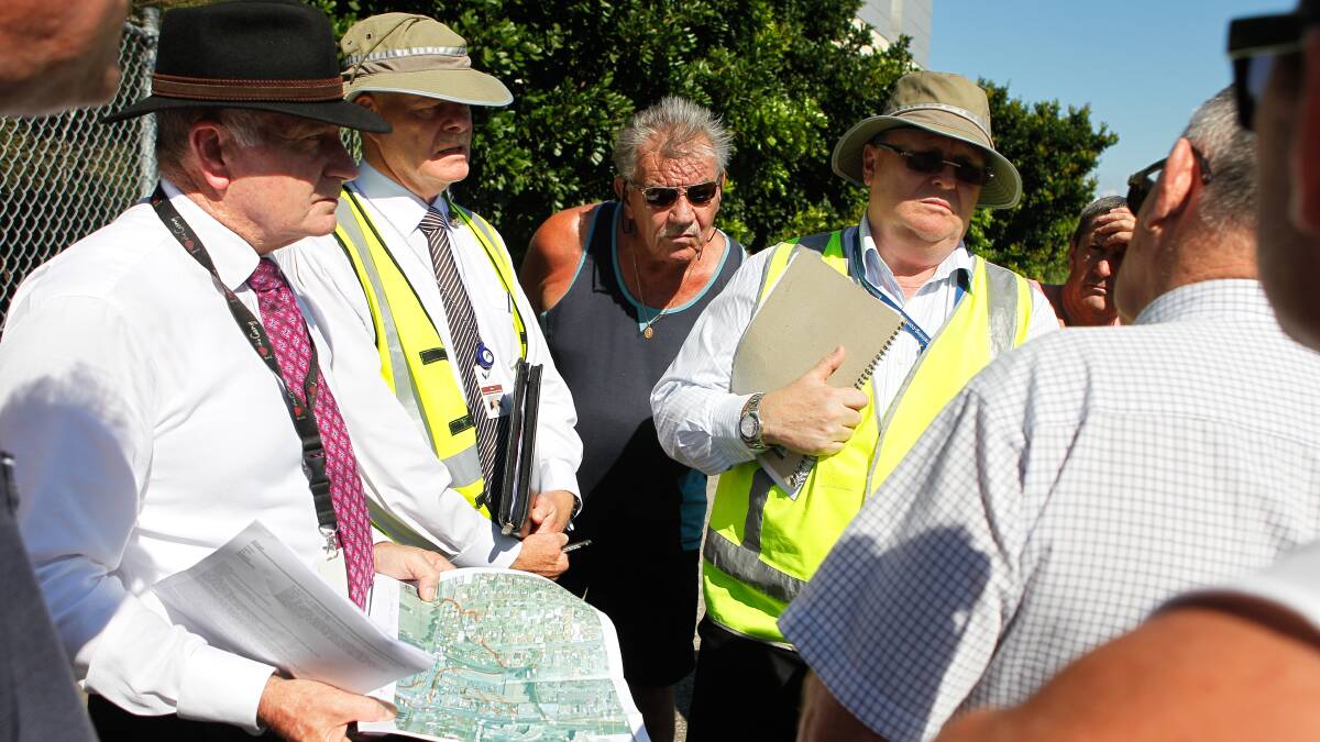 Gordon Bradbery and council representatives with Kembla Street residents. Picture: CHRISTOPHER CHAN
