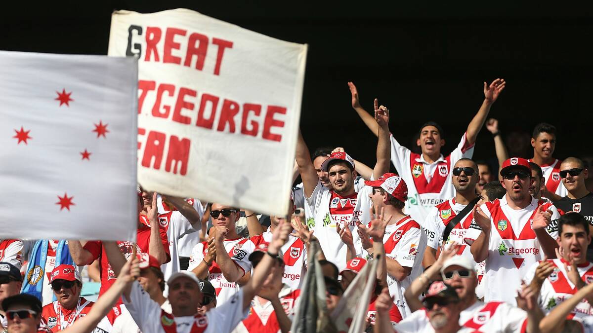 Dragons fans show their support during the match between the Dragons and Tigers at ANZ Stadium. Picture: GETTY IMAGES