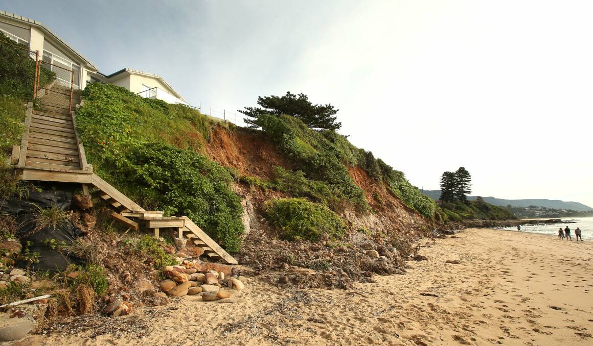 Land drops away sharply near a home between Corbett Avenue and Woodland Avenue at Thirroul overlooking McCauleys Beach. Picture: KIRK GILMOUR