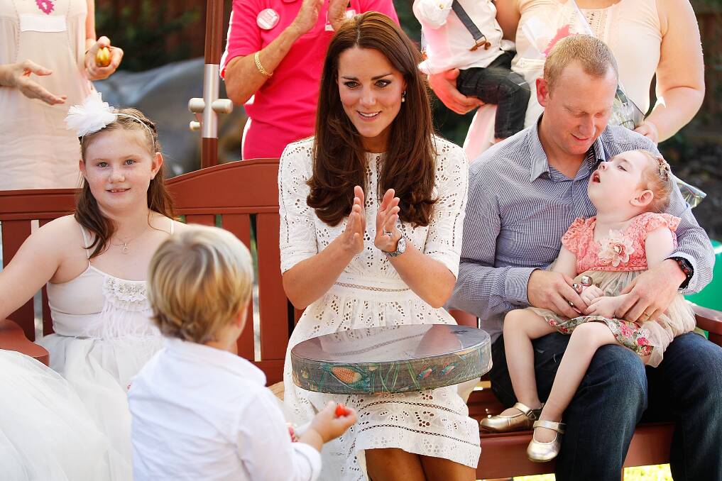 Catherine, Duchess of Cambridge, sings with children at Bear Cottage. Picture: GETTY IMAGES