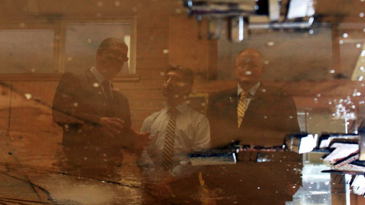 Minister for the Illawarra John Ajaka tours flood-damaged Bulli High after heavy rains fell on the region. Picture: ANDY ZAKELI 