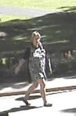 Security footage of the woman suspected of setting alight a flag at the Hyde Park war memorial. Picture: NSW Police