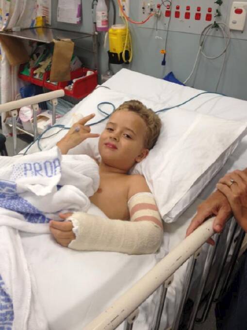 Harry Bailey, now 8, was trampolining at a birthday party when he broke his arm.