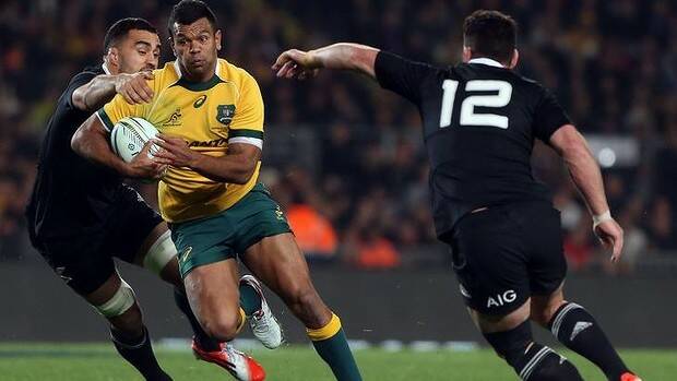 Kurtley Beale is closed down by Liam Messam and Ryan Crotty. Picture: AFP