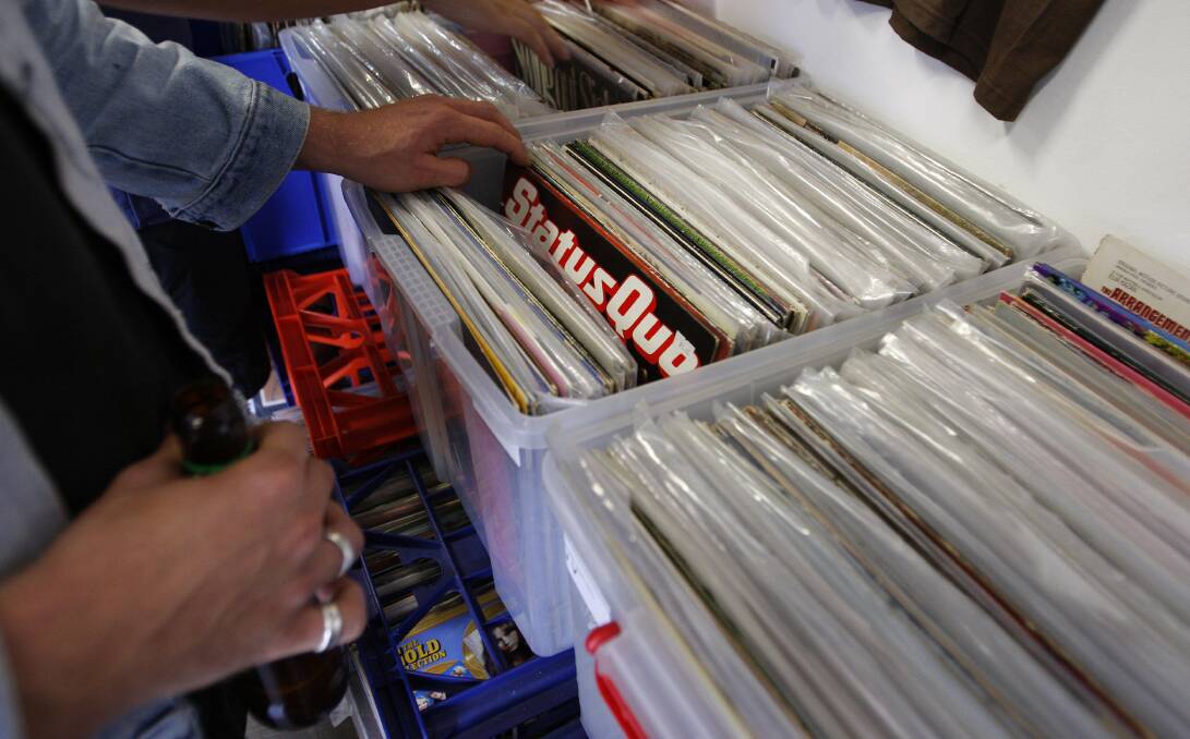 Vinyl lovers rifle through records at Music Farmers. Picture: ANDY ZAKELI