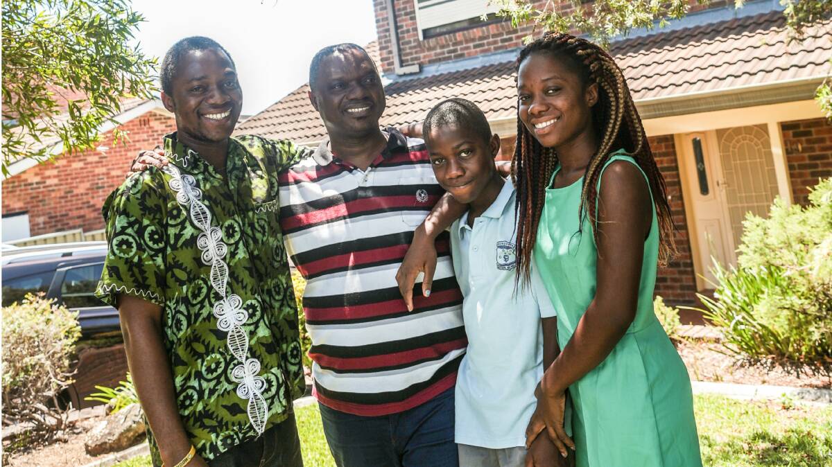 Lindgren Farley with his children, from left, Grant, Dwight and Delley. The siblings were detained in Abu Dhabi and had to be quarantined for three weeks on arrival in Australia. Picture: ADAM McLEAN