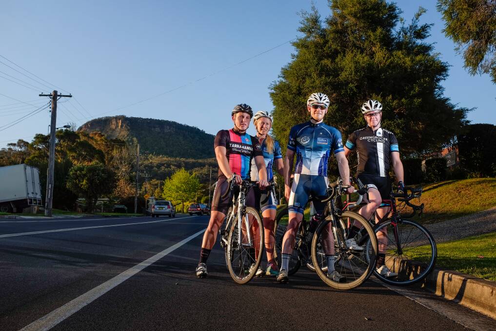 Illawarra cyclists Paul Burns, Jules Verheyen, Luke Meers and Chris Brown at the base of Mount Keira. Picture: CHRISTOPHER CHAN