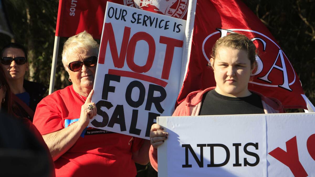 Illawarra disability workers hold a stopwork meeting and protest on Foleys Road, Gwynneville, in August. Picture: ANDY ZAKELI