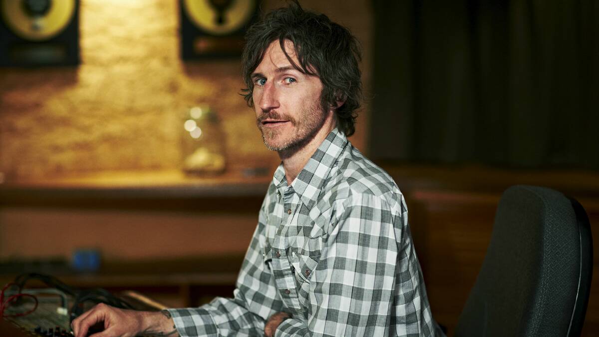 Tim Rogers takes to the road to get time to himself, writing new songs as he drives between venues.