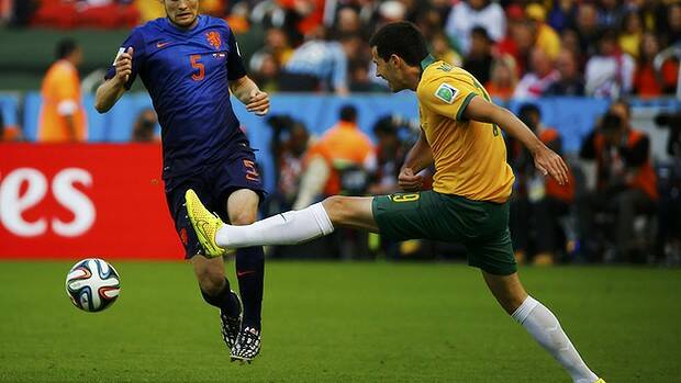 Ryan McGowan reaches for the ball in the Socceroos' game against the Netherlands. Picture: REUTERS