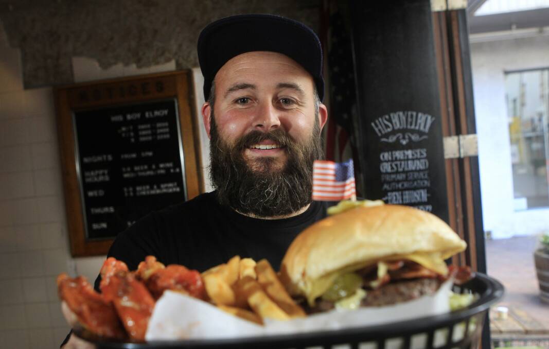 Co-owner Ben Hudson with the Fat Boy burger. Picture: ANDY ZAKELI