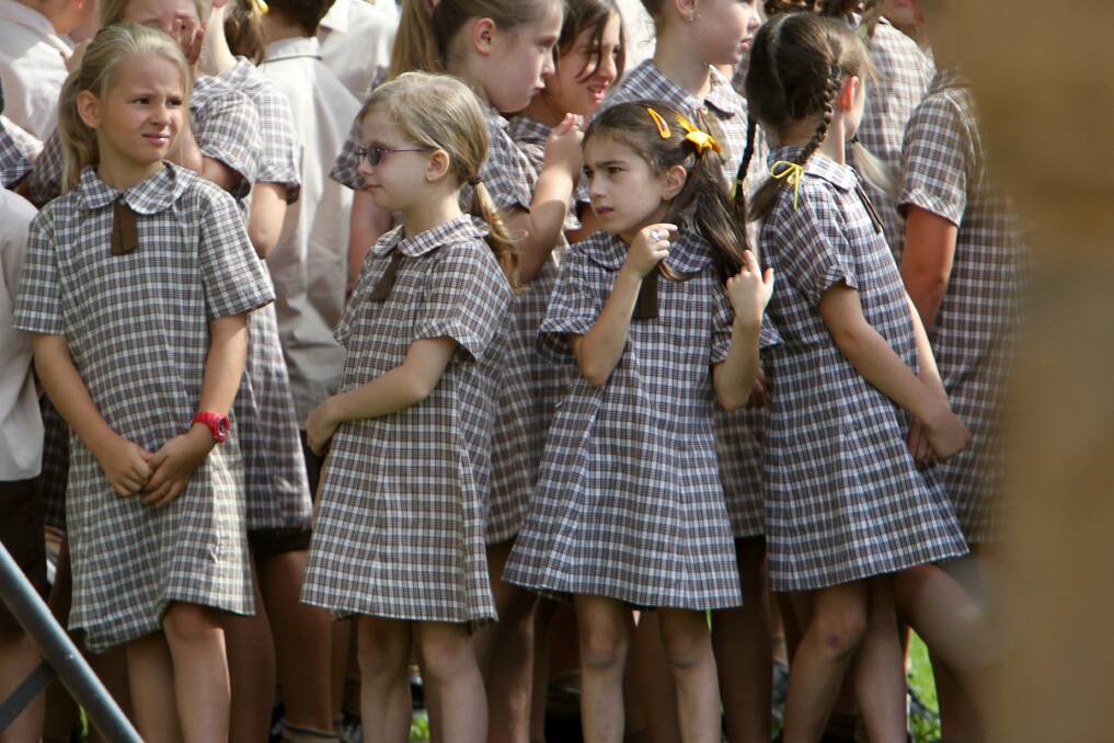 Students attend an Anzac Day ceremony in MacCabe Park. Picture: GREG TOTMAN
