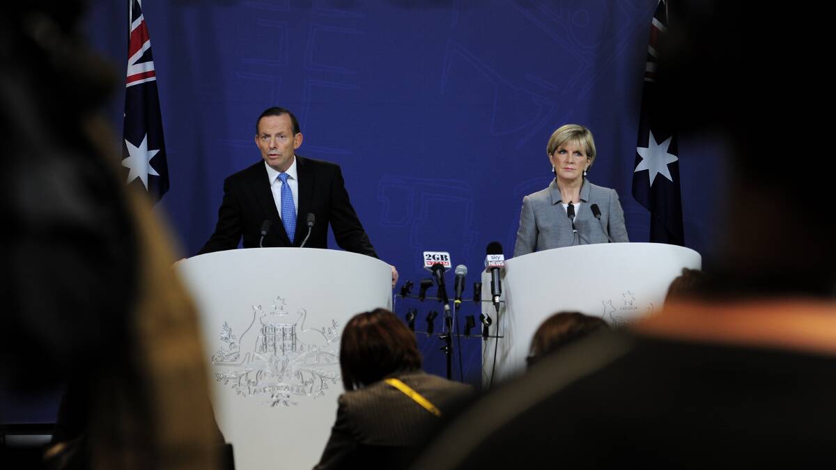 Prime Minister Tony Abbott and Foreign Minister Julie Bishop warn media answers of the MH17 disaster may take many weeks to emerge.  Pictures: GETTY IMAGES