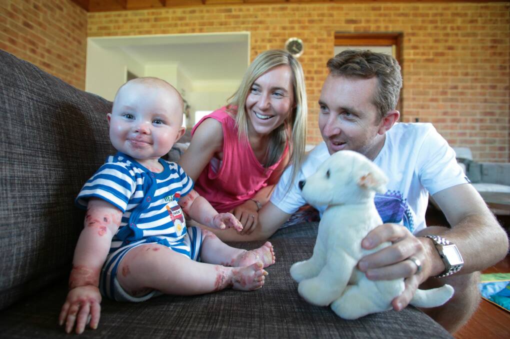 Melissa and Jeff North with their son Ky, eight months. Picture: ADAM McLEAN