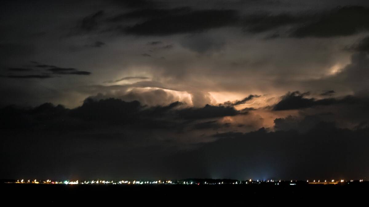 The skies over Lake Illawarra on Sunday night. Picture: CHRISTOPHER CHAN