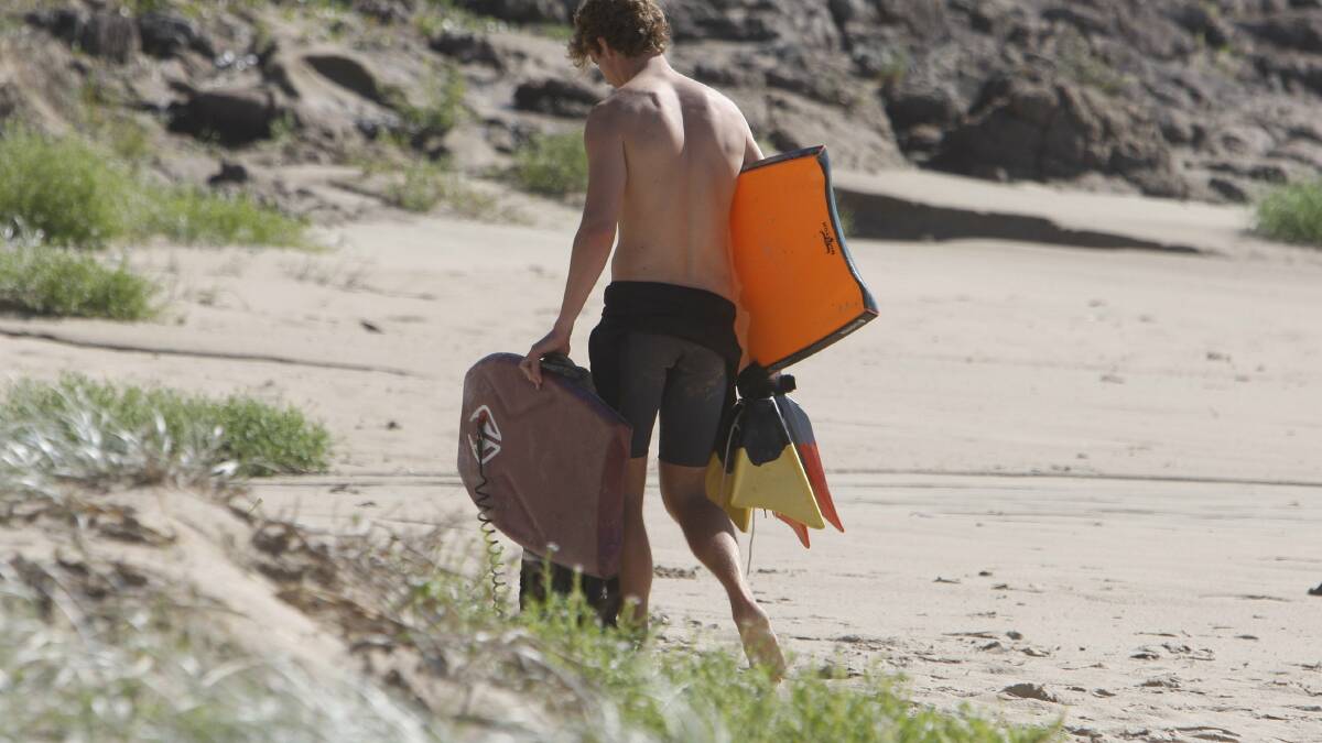 PHOTOS: Surfer suffers back injury at Mystics