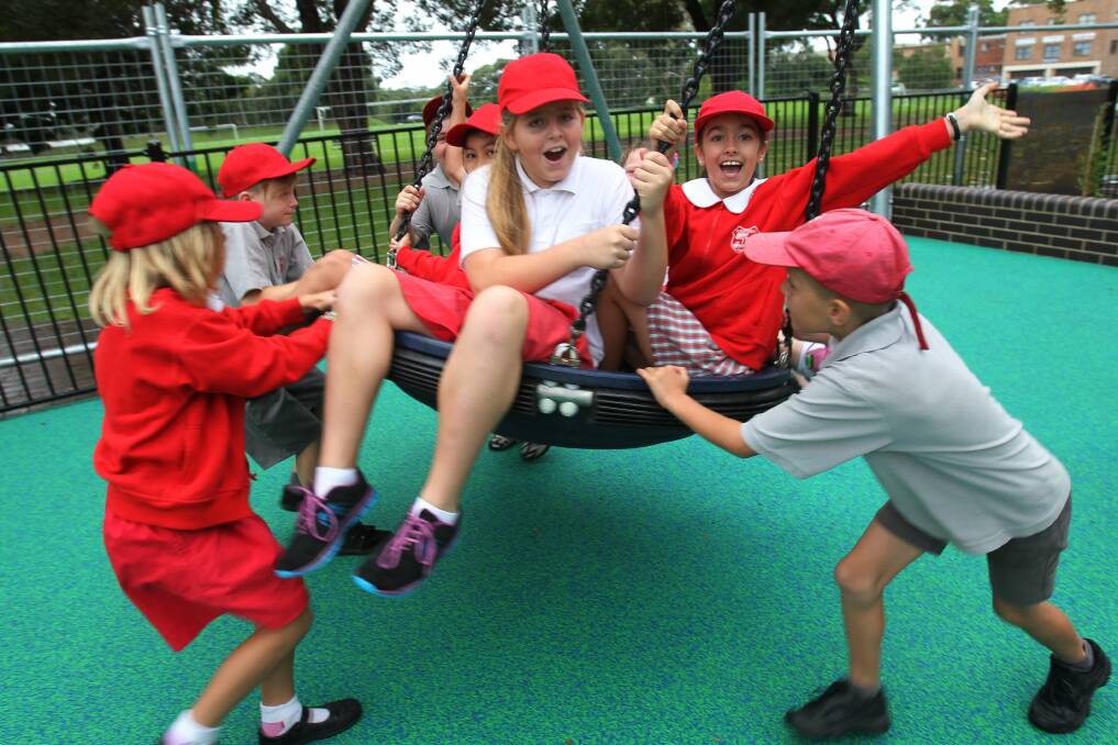 Children from Corrimal Public School get in the swing of things at Luke's Place. Picture: GREG TOTMAN