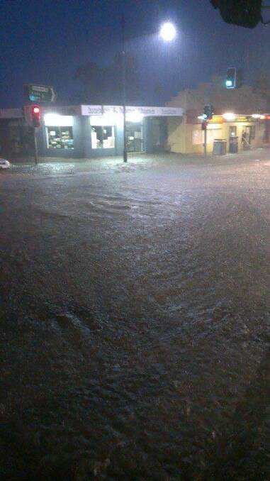 Floodwaters are covering the road at Albion Park at 10.47pm on Monday.