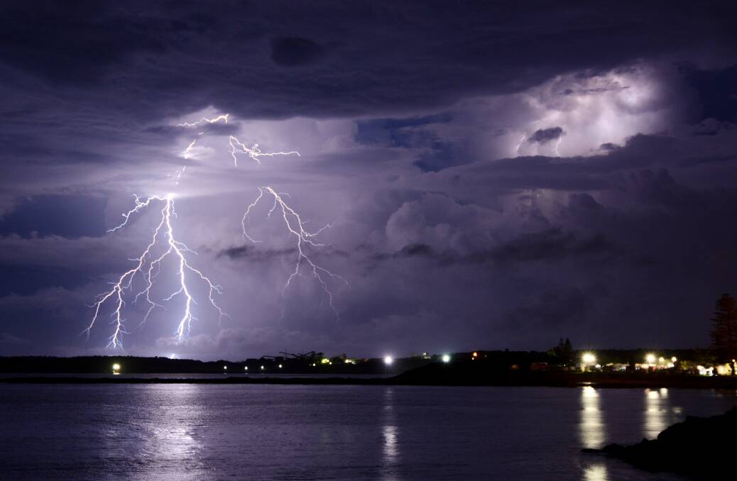 Lightning flashes over Shellharbour on Sunday night. Picture: SHARON GREIG
