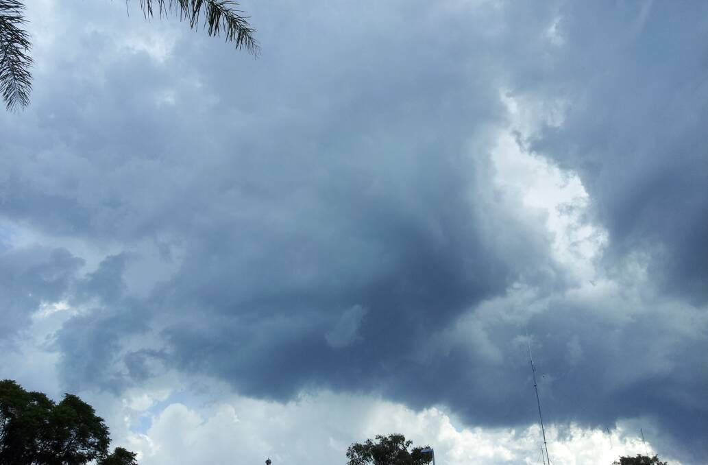 Storm clouds build over Oak Flats on Sunday afternoon.  Picture: DARREN MALONE