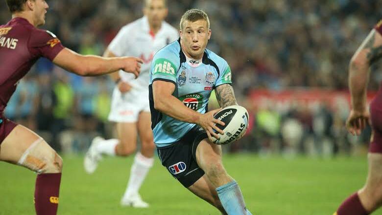 Show and go: Trent Hodkinson etches his name into Origin history. Picture: CHRISTOPHER CHAN