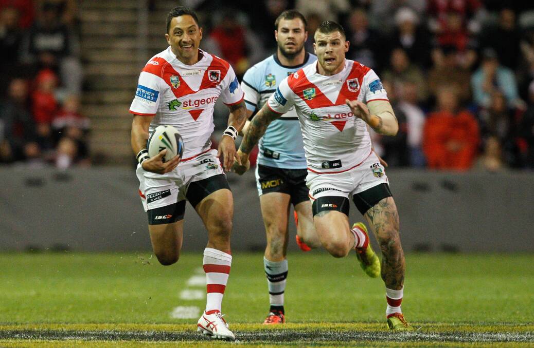 Benji Marshall races downfield in the Dragons' 30-0 rout of the Sharks. Picture: CHRISTOPHER CHAN